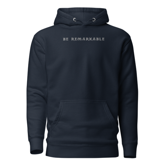 "Be remarkable" printed on a navy blazer on an invisible / simulated body