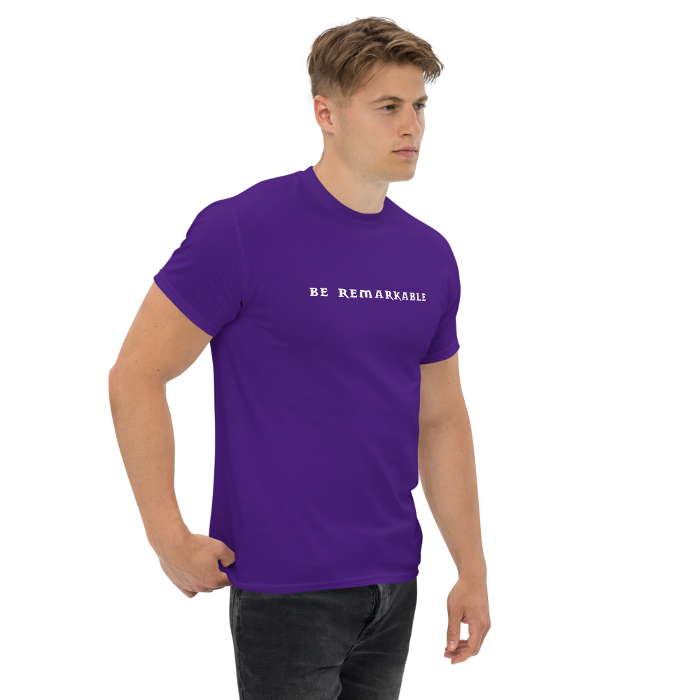 "Be remarkable" printed on a purple unisex classic tee worn by a male