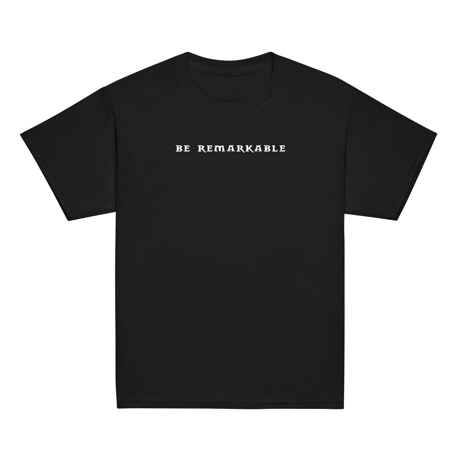 "Be remarkable" printed on a black youth classic tee laying on a flat surface