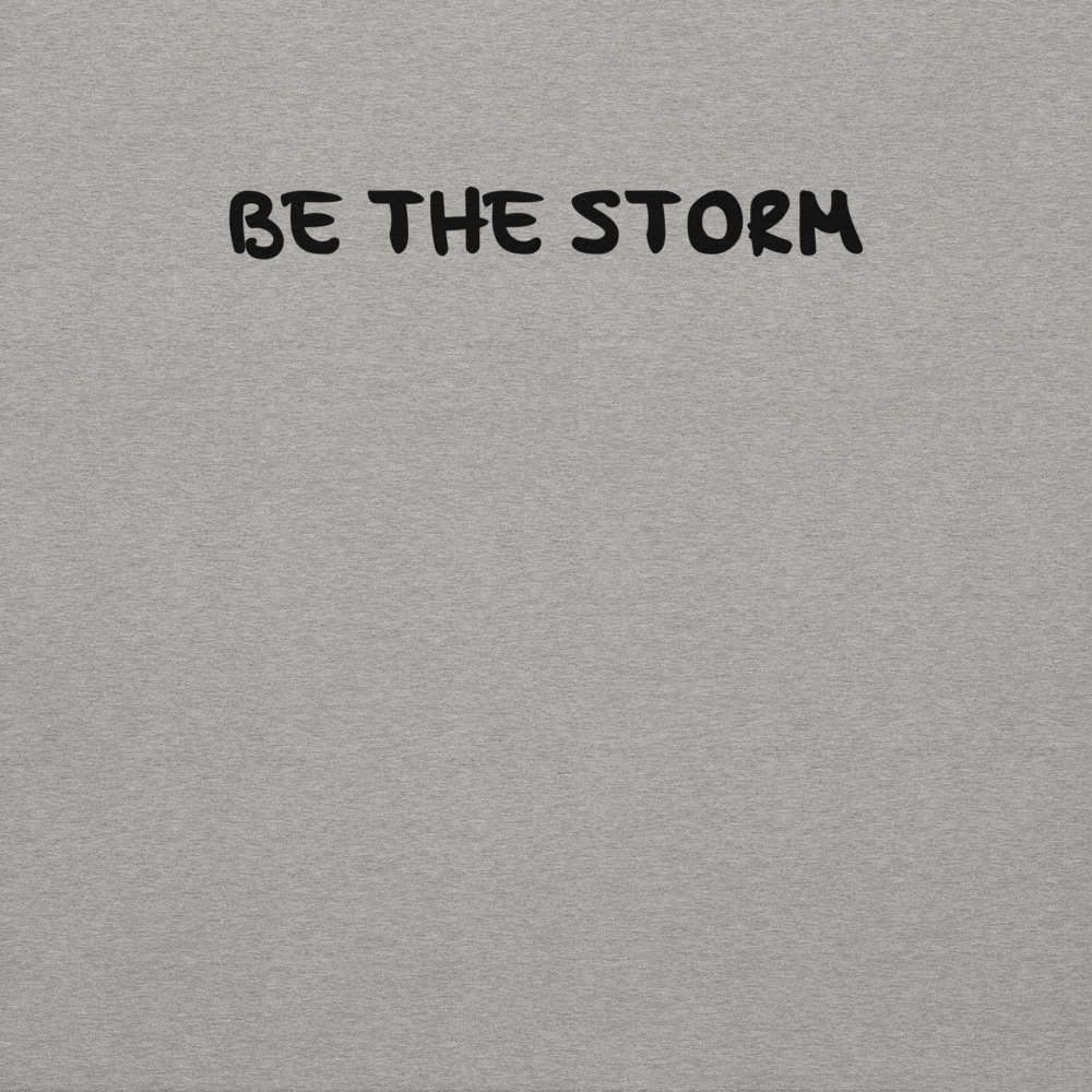 "Be the storm" printed on a carbon grey background