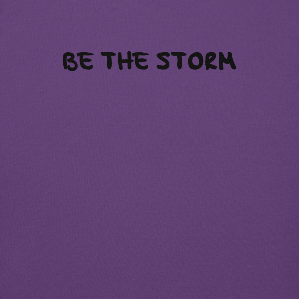"Be the storm" printed on a purple background