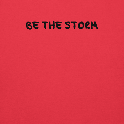 "Be the storm" printed on a team red background