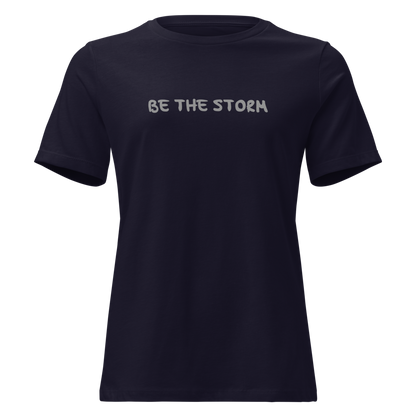 "Be the storm" printed on a navy on an invisible / simulated body