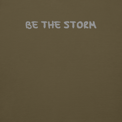 "Be the storm" printed on a military green background