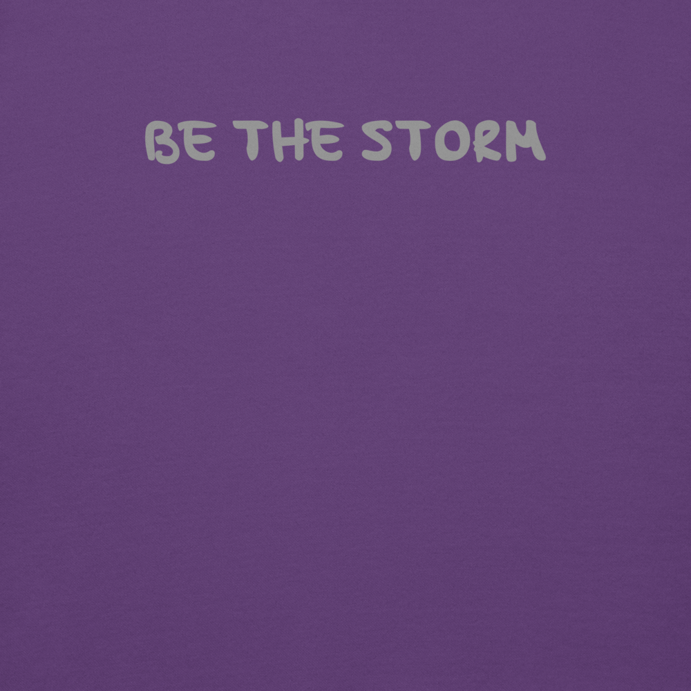 "Be the storm" printed on a purple background