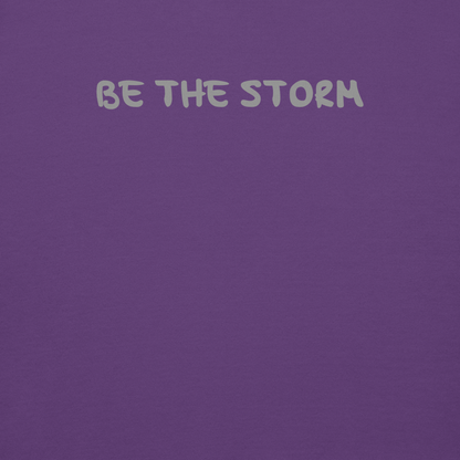"Be the storm" printed on a purple background