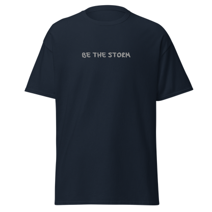 "Be the storm" printed on a navy on an invisible body