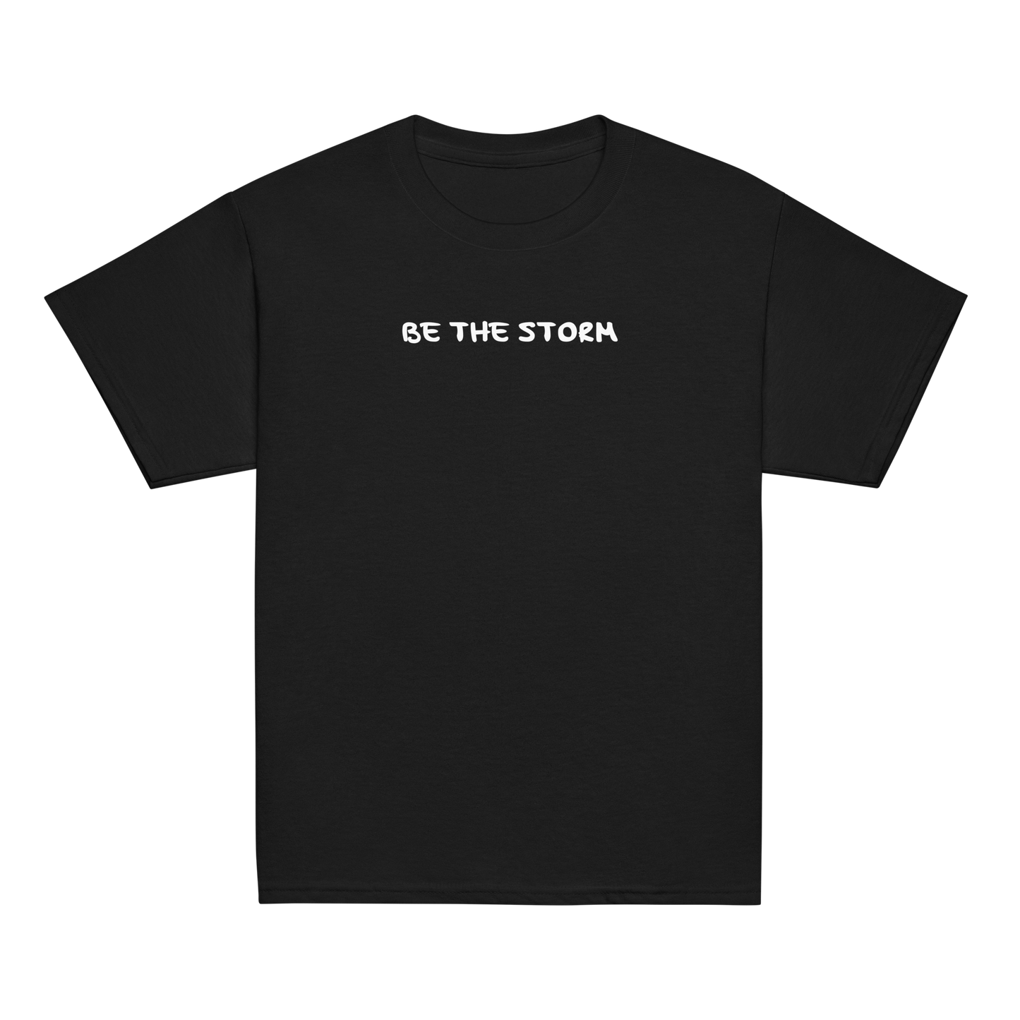 "Be the storm" printed on a black youth classic tee laying on a flat surface