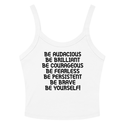 "Be Audacious Be Brilliant Be Courageous Be Fearless Be Persistent Be Brave Be Yourself!" printed on a solid white blend women's micro-rib tanktop laying on a flat surface amongst sunglasses and shorts