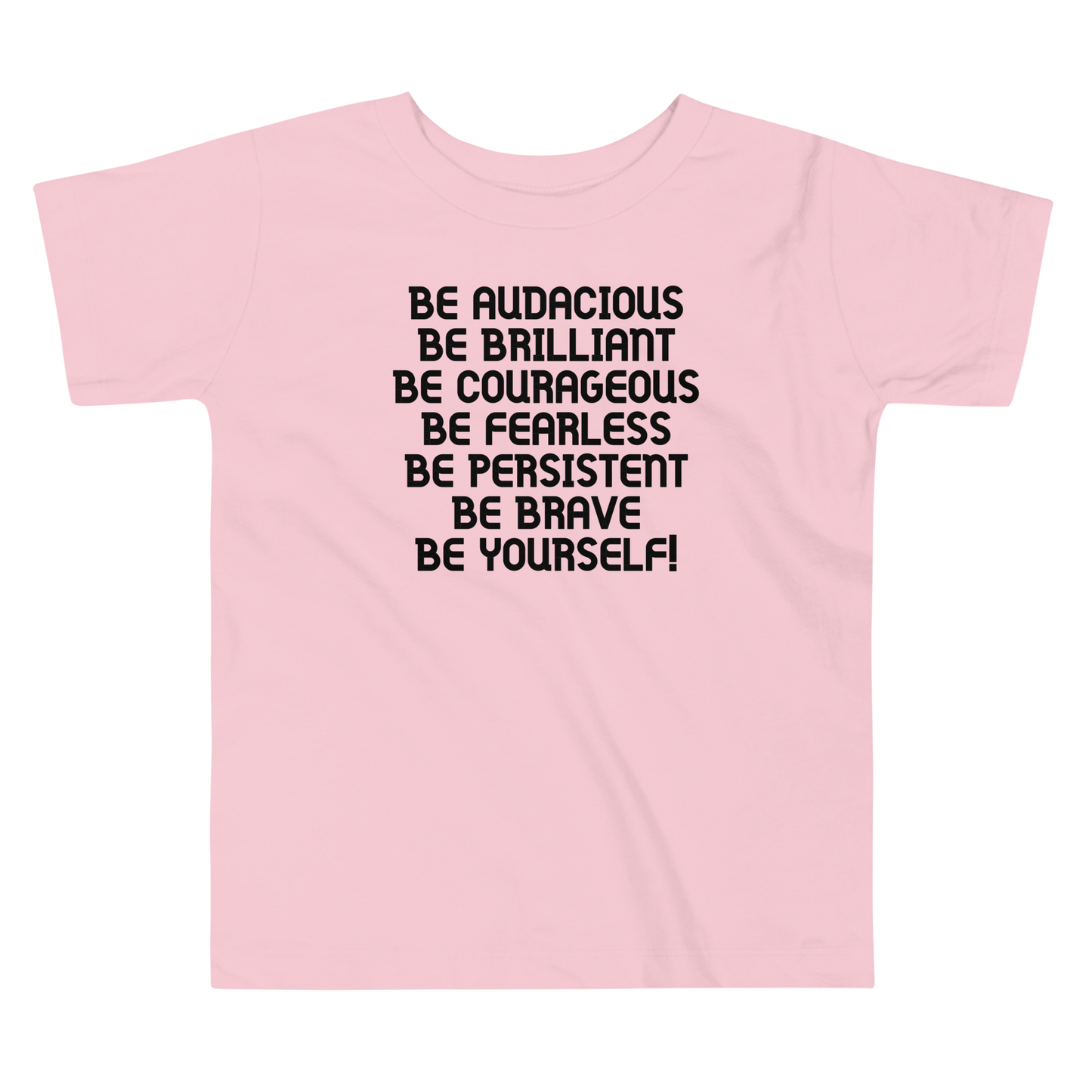 "Be Audacious Be Brilliant Be Courageous Be Fearless Be Persistent Be Brave Be Yourself!" printed on a pink toddler short sleeve tee laying on a flat surface