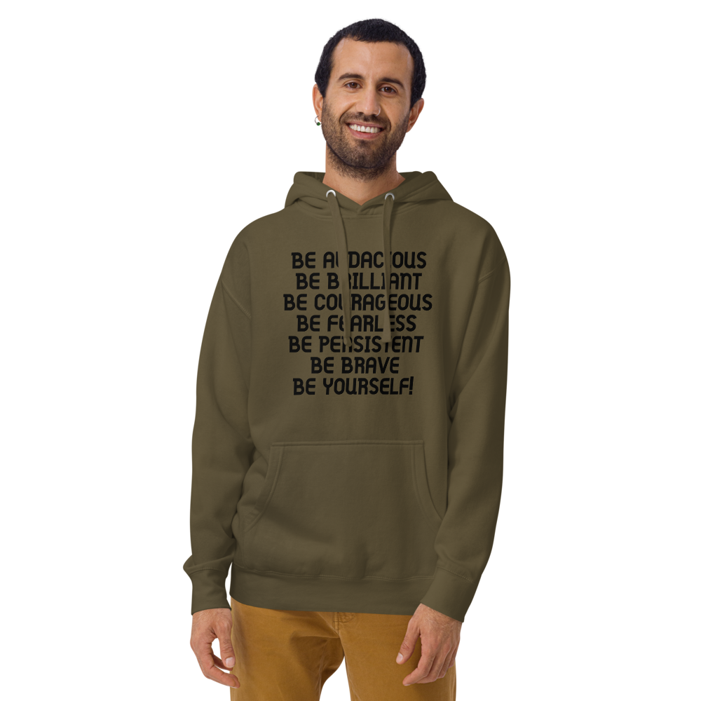 "Be Audacious Be Brilliant Be Courageous Be Fearless Be Persistent Be Brave Be Yourself!" printed on a military green warn by a male
