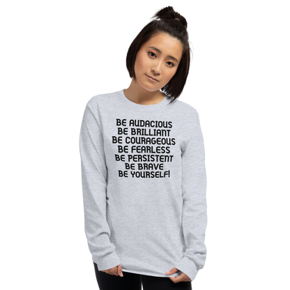 "Be Audacious Be Brilliant Be Courageous Be Fearless Be Persistent Be Brave Be Yourself!" printed on a sport grey men's long sleeve shirt worn by a female