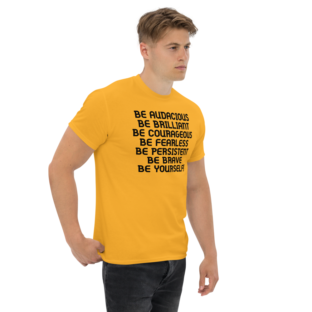 "Be Audacious Be Brilliant Be Courageous Be Fearless Be Persistent Be Brave Be Yourself!" printed on a gold unisex classic tee worn by a male