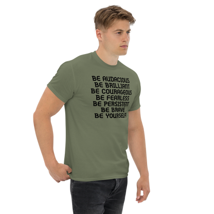 "Be Audacious Be Brilliant Be Courageous Be Fearless Be Persistent Be Brave Be Yourself!" printed on a military green unisex classic tee worn by a male