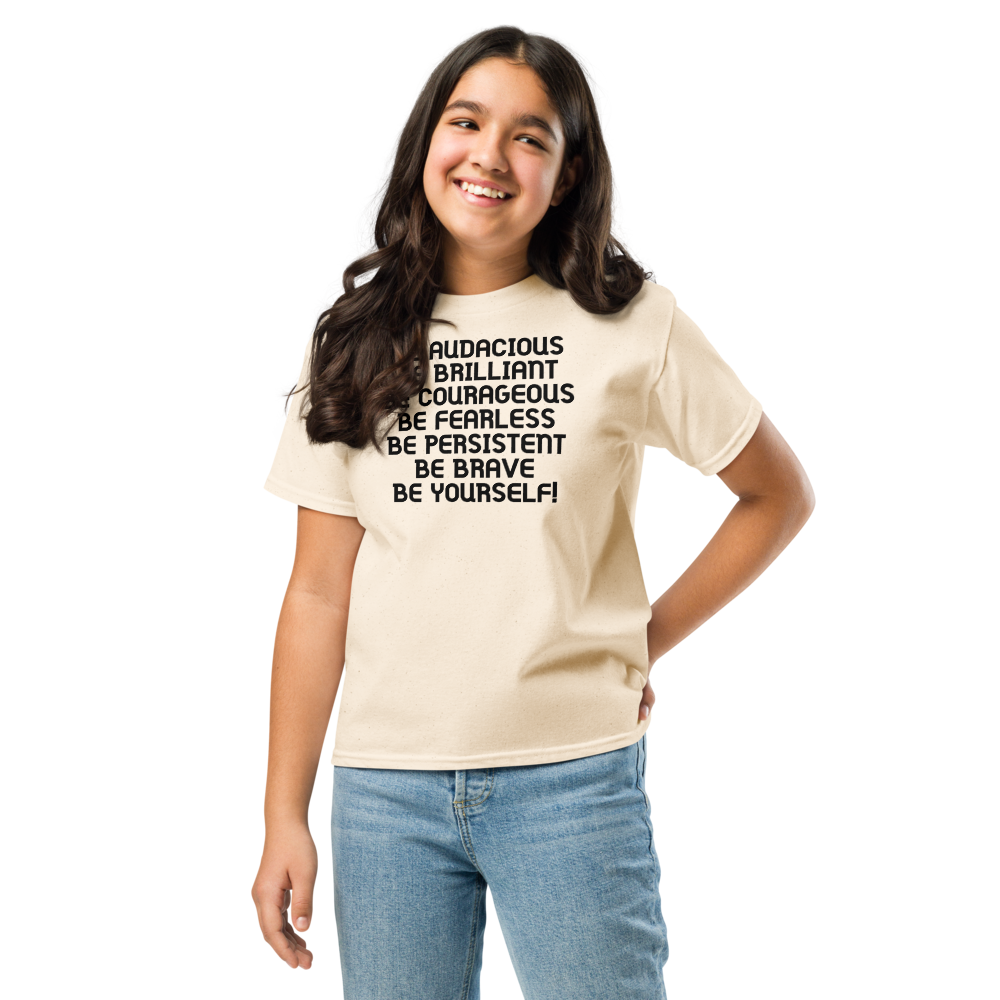 "Be Audacious Be Brilliant Be Courageous Be Fearless Be Persistent Be Brave Be Yourself!" printed on a natural youth classic tee worn by a female