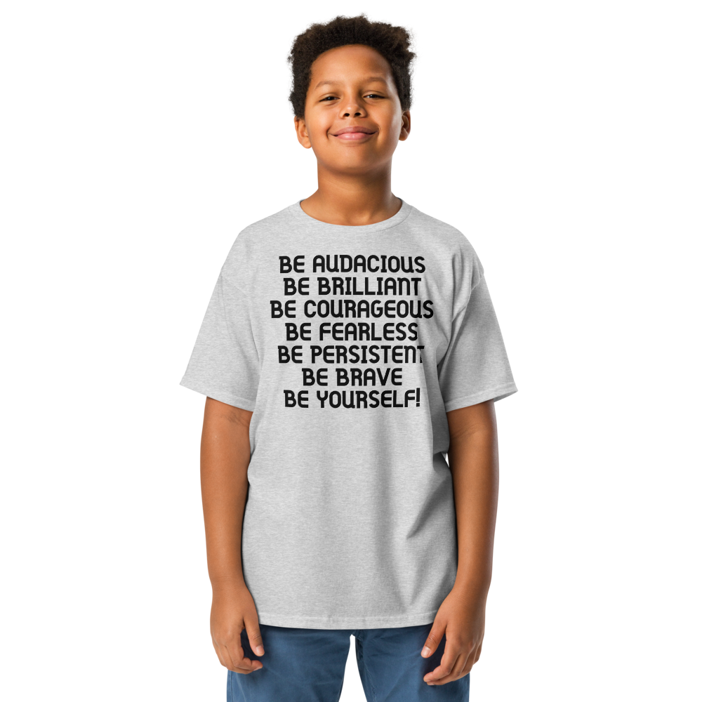 "Be Audacious Be Brilliant Be Courageous Be Fearless Be Persistent Be Brave Be Yourself!" printed on a sport grey youth classic tee worn by a male
