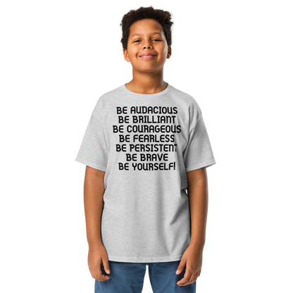 "Be Audacious Be Brilliant Be Courageous Be Fearless Be Persistent Be Brave Be Yourself!" printed on a sport grey youth classic tee worn by a male