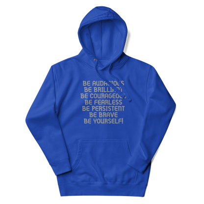 "Be Audacious Be Brilliant Be Courageous Be Fearless Be Persistent Be Brave Be Yourself!" printed on a team royal unisex hoodie laying on a flat surface with the hood up