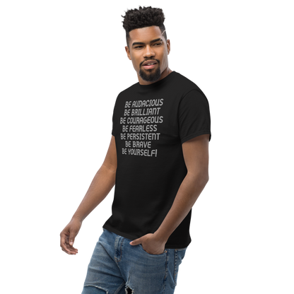 "Be Audacious Be Brilliant Be Courageous Be Fearless Be Persistent Be Brave Be Yourself!" printed on a black unisex classic tee worn by a male