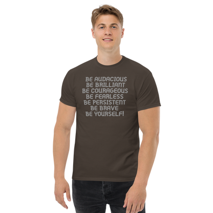 "Be Audacious Be Brilliant Be Courageous Be Fearless Be Persistent Be Brave Be Yourself!" printed on a dark chocolate unisex classic tee worn by a male