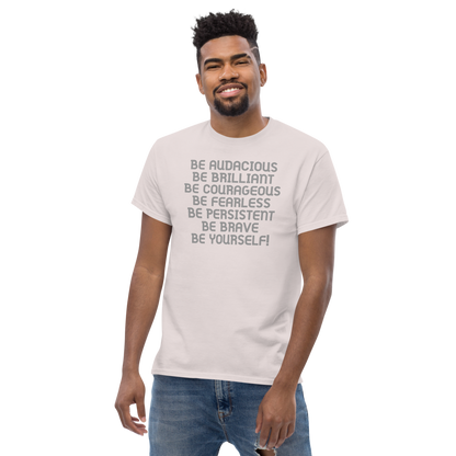 "Be Audacious Be Brilliant Be Courageous Be Fearless Be Persistent Be Brave Be Yourself!" printed on a ice grey unisex classic tee worn by a male