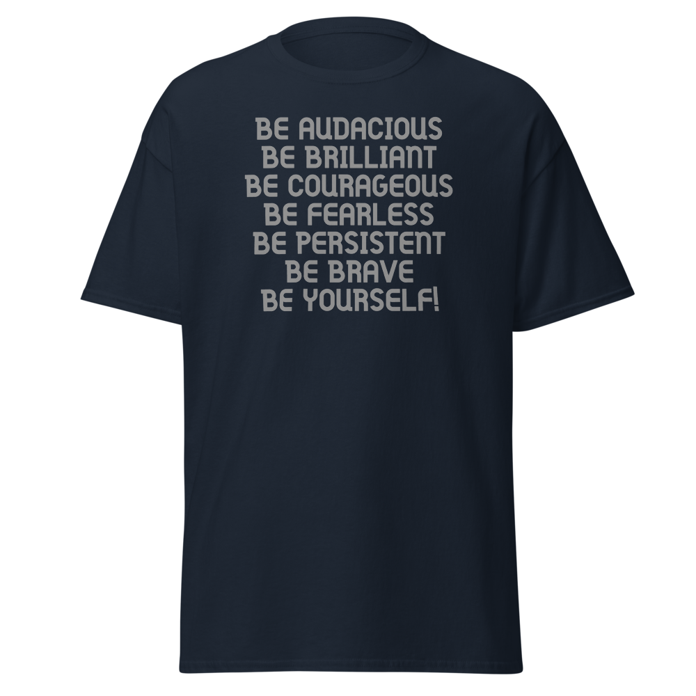 "Be Audacious Be Brilliant Be Courageous Be Fearless Be Persistent Be Brave Be Yourself!" printed on a navy unisex classic tee laying on a flat surface