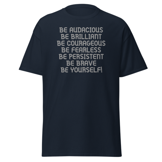 "Be Audacious Be Brilliant Be Courageous Be Fearless Be Persistent Be Brave Be Yourself!" printed on a navy unisex classic tee laying on a flat surface