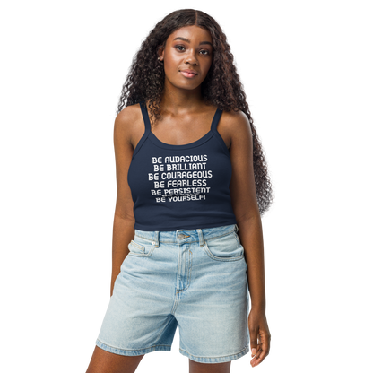 "Be Audacious Be Brilliant Be Courageous Be Fearless Be Persistent Be Brave Be Yourself!" printed on a solid navy blend women's micro-rib tanktop worn by a female