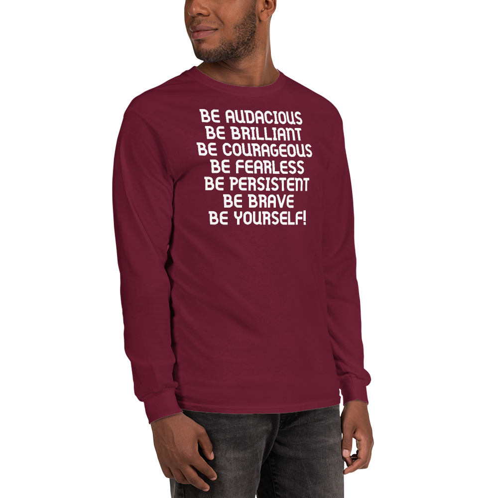 "Be Audacious Be Brilliant Be Courageous Be Fearless Be Persistent Be Brave Be Yourself!" printed on a maroon men's long sleeve shirt worn by a male