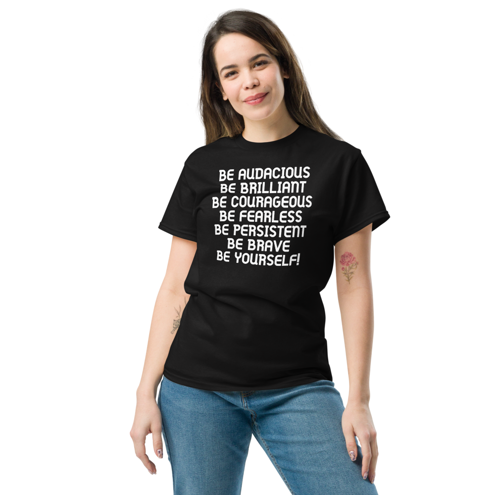 "Be Audacious Be Brilliant Be Courageous Be Fearless Be Persistent Be Brave Be Yourself!" printed on a black unisex classic tee worn by a female