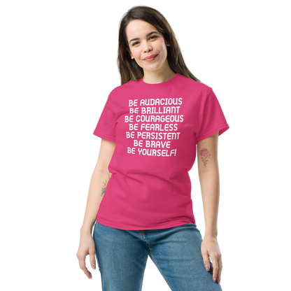 "Be Audacious Be Brilliant Be Courageous Be Fearless Be Persistent Be Brave Be Yourself!" printed on a heliconia unisex classic tee worn by a female