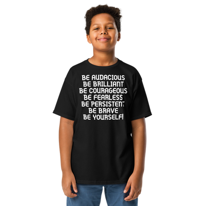 "Be Audacious Be Brilliant Be Courageous Be Fearless Be Persistent Be Brave Be Yourself!" printed on a black youth classic tee worn by a male