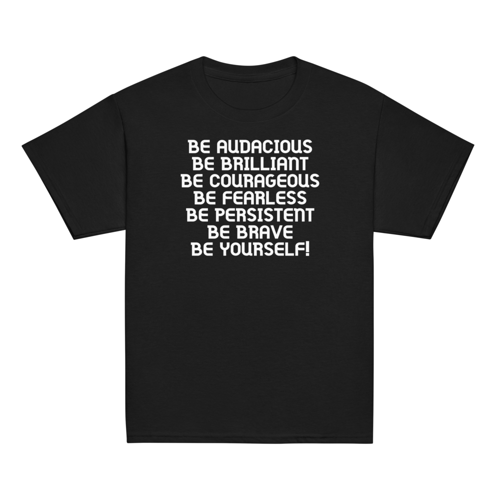 "Be Audacious Be Brilliant Be Courageous Be Fearless Be Persistent Be Brave Be Yourself!" printed on a black youth classic tee laying on a flat surface