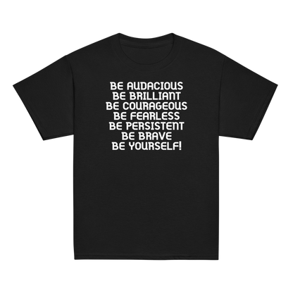 "Be Audacious Be Brilliant Be Courageous Be Fearless Be Persistent Be Brave Be Yourself!" printed on a black youth classic tee laying on a flat surface
