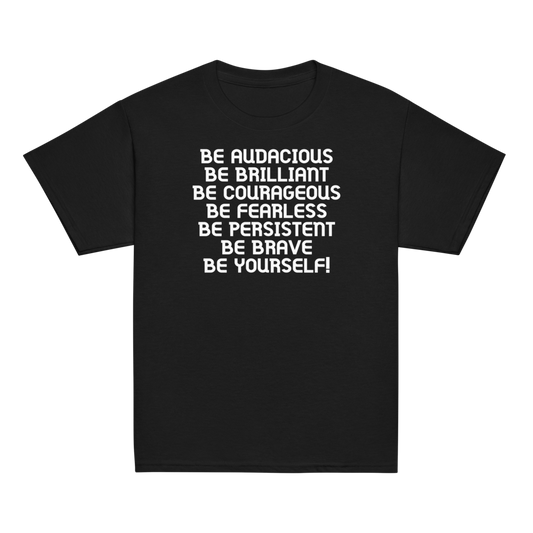 "Be Audacious Be Brilliant Be Courageous Be Fearless Be Persistent Be Brave Be Yourself!" printed on a black youth classic tee laying on a flat surface