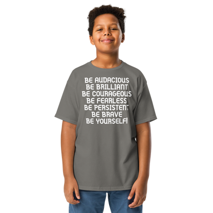 "Be Audacious Be Brilliant Be Courageous Be Fearless Be Persistent Be Brave Be Yourself!" printed on a charcoal youth classic tee worn by a male
