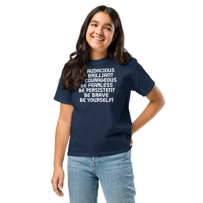 "Be Audacious Be Brilliant Be Courageous Be Fearless Be Persistent Be Brave Be Yourself!" printed on a navy youth classic tee worn by a female