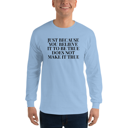 "Just because you believe it to be true does not make it true" printed on a light blue men's long sleeve shirt worn by a male