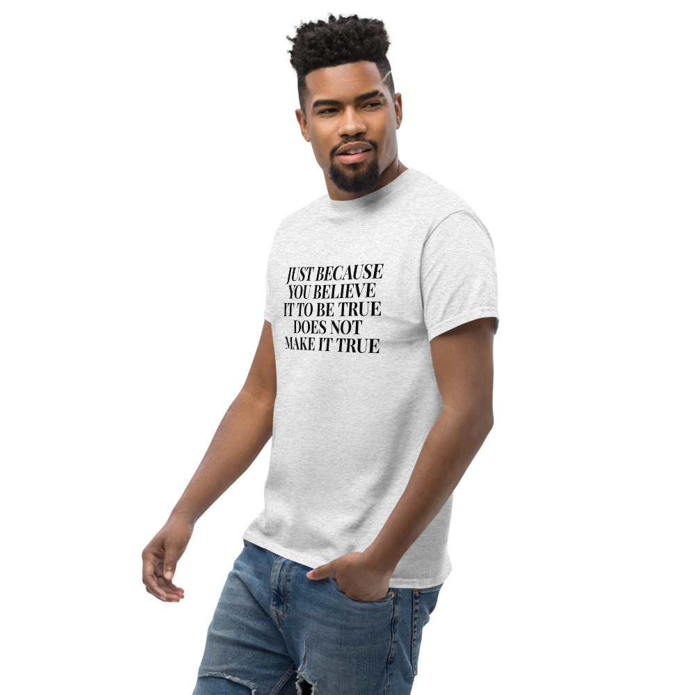 "Just because you believe it to be true does not make it true" printed on a ash unisex classic tee worn by a male