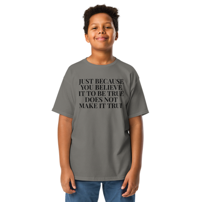 "Just because you believe it to be true does not make it true" printed on a charcoal youth classic tee worn by a male