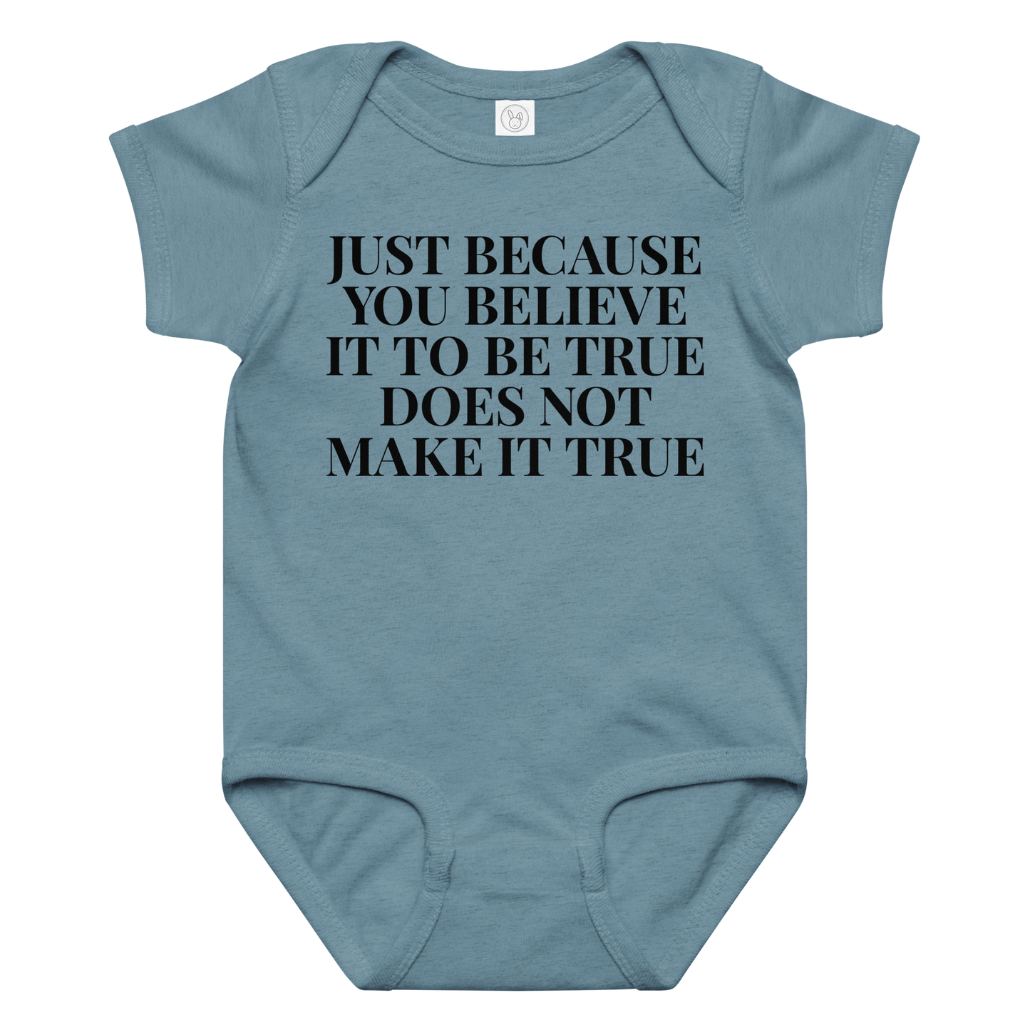 "Just because you believe it to be true does not make it true" printed on a vintage indigo baby jersey bodysuit laying on a flat surface amongst other clothes