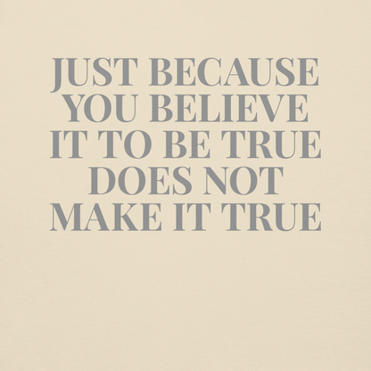 "Just because you believe it to be true does not make it true" printed on a bone background