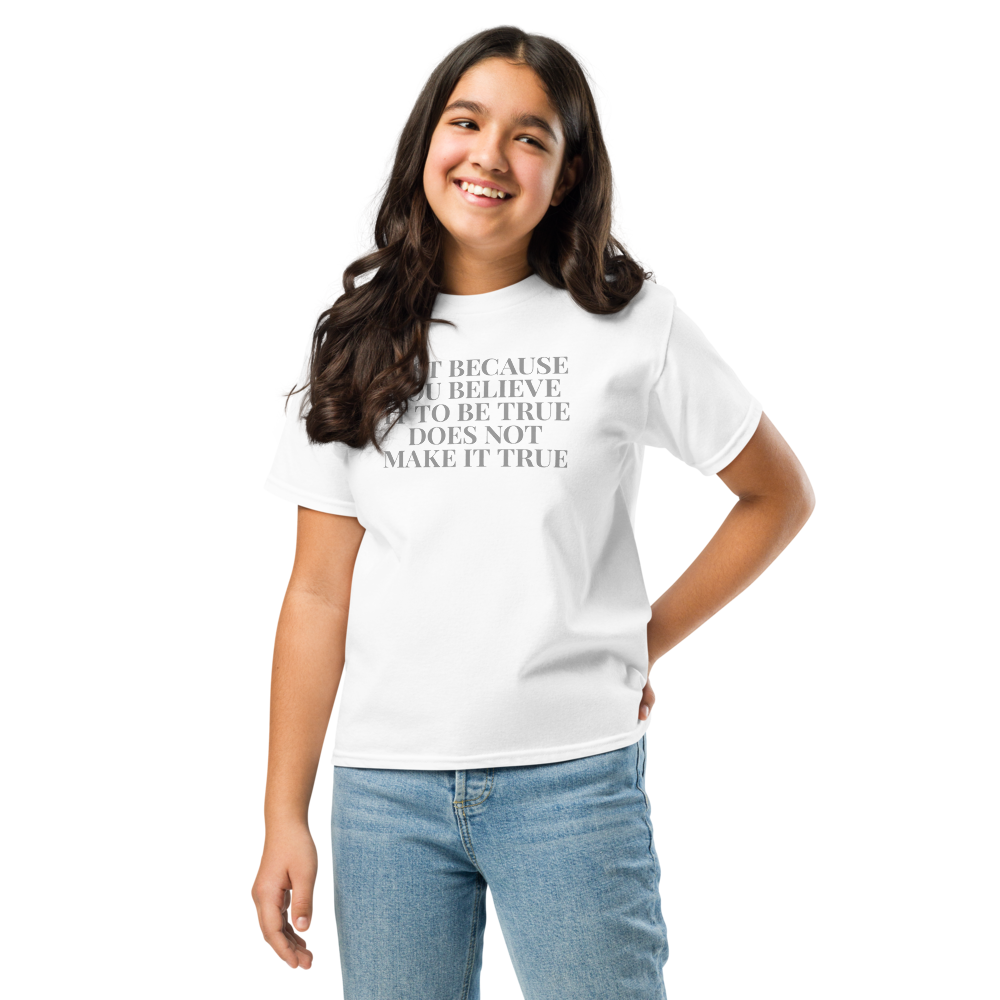"Just because you believe it to be true does not make it true" printed on a white youth classic tee worn by a female