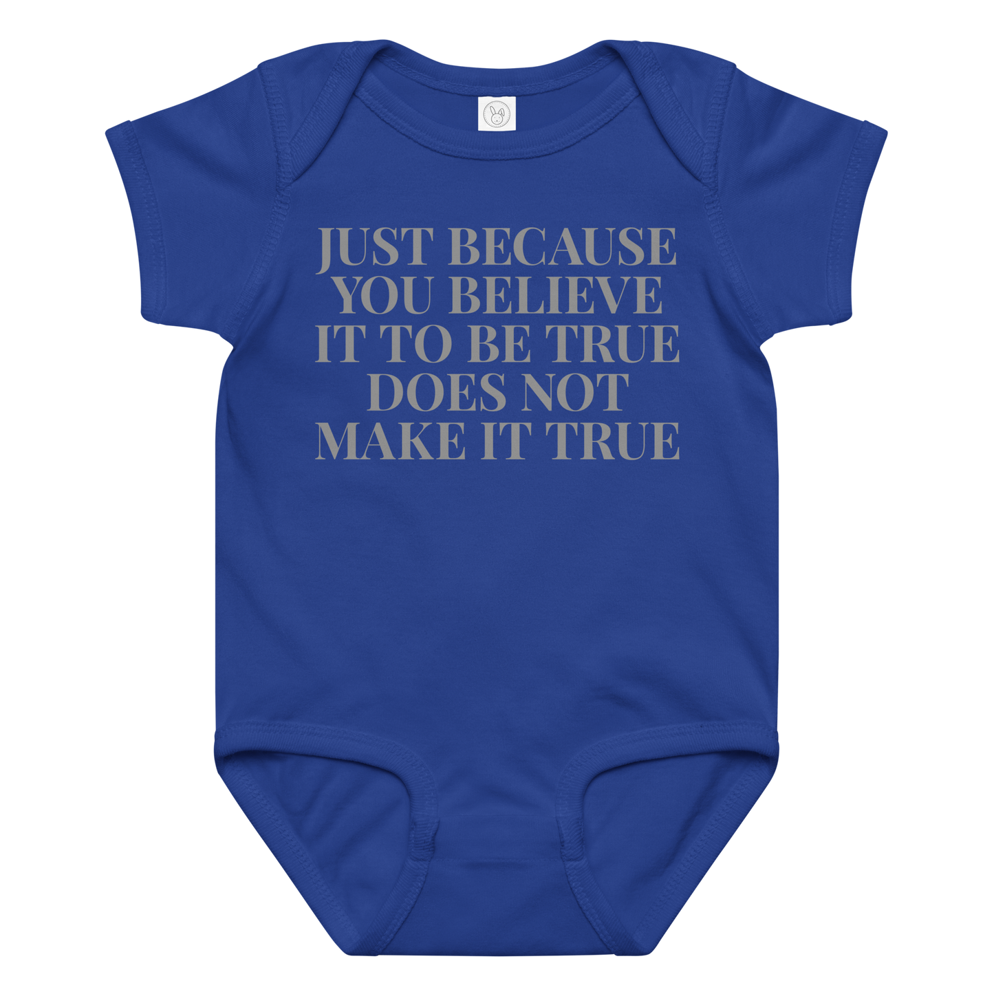 "Just because you believe it to be true does not make it true" printed on a royal baby jersey bodysuit laying on a flat surface amongst other clothes