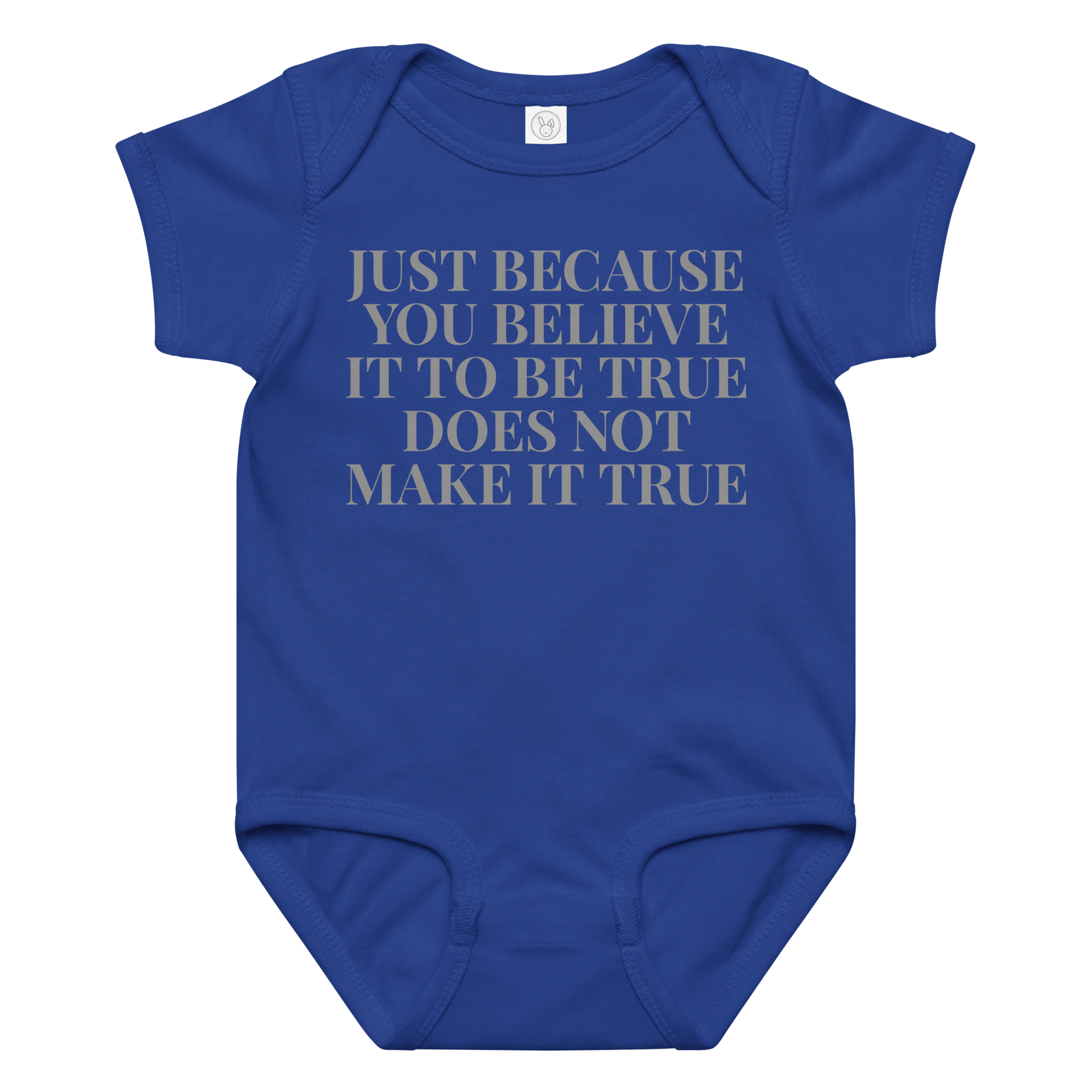 "Just because you believe it to be true does not make it true" printed on a royal baby jersey bodysuit laying on a flat surface amongst other clothes