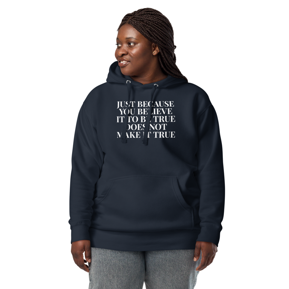 "Just because you believe it to be true does not make it true" printed on a navy blazer unisex hoodie worn by a female