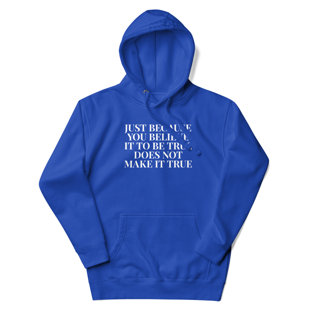 "Just because you believe it to be true does not make it true" printed on a team royal unisex hoodie laying on a flat surface with the hood up