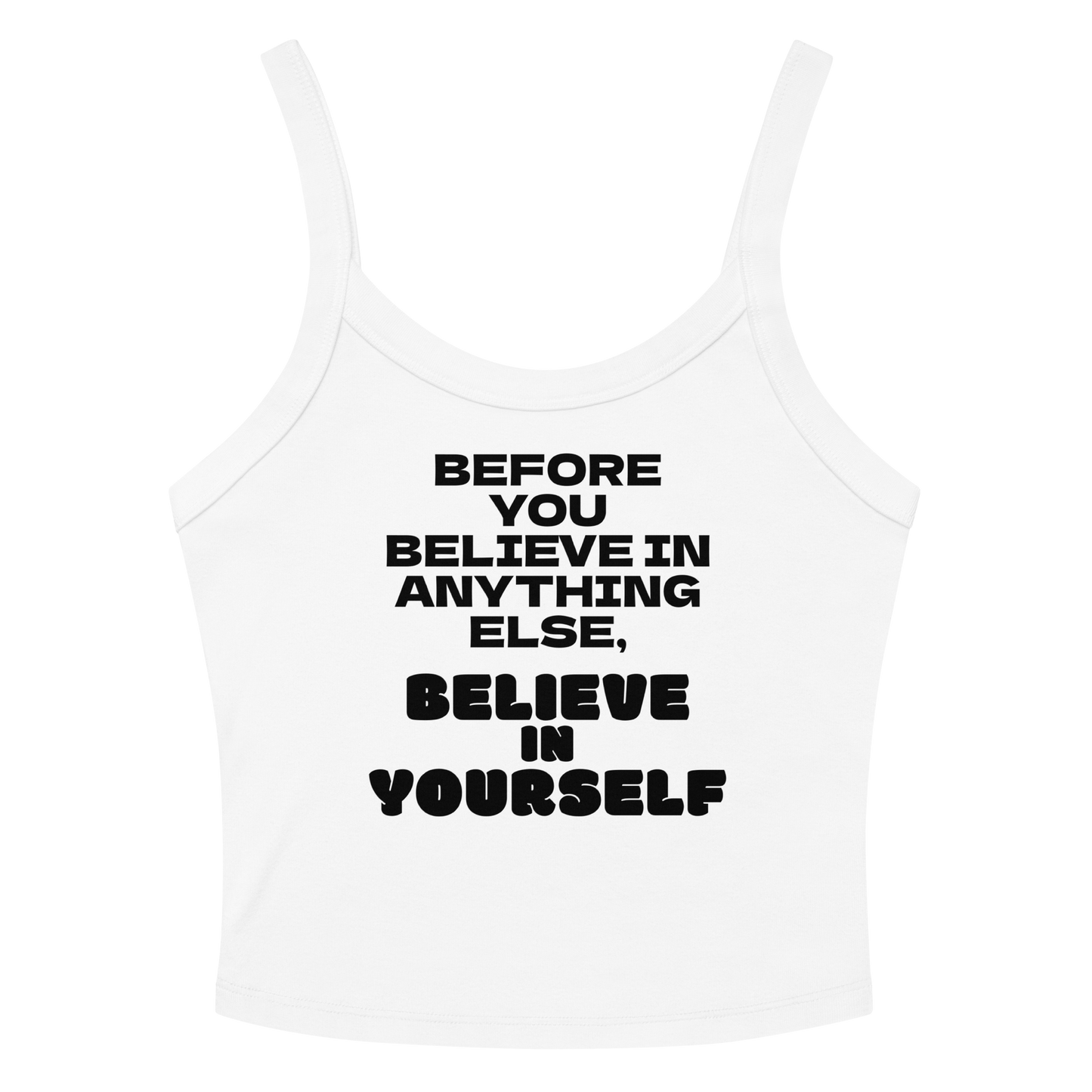 "Before you believe in anything else, believe in yourself" printed on a solid white blend women's micro-rib tanktop laying on a flat surface amongst sunglasses and shorts