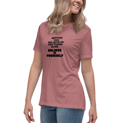 "Before you believe in anything else, believe in yourself" printed on a heather mauve women's relaxed t-shirt worn by a female