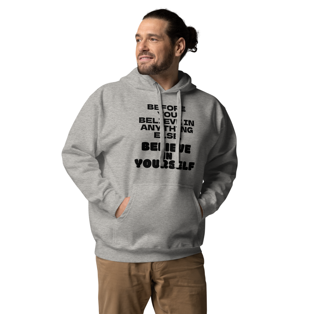 "Before you believe in anything else, believe in yourself" printed on a carbon grey unisex hoodie worn by a male